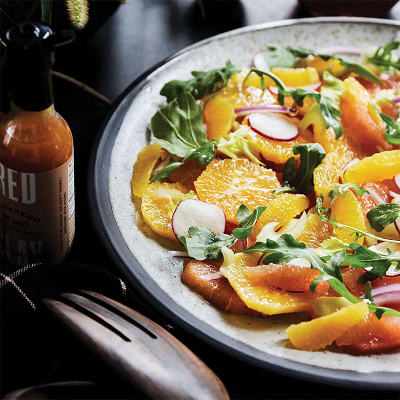 The warm heat of Red Clay’s Habanero hot sauce plays well with a variety of sweet-tart citrus in this elegant salad. Assemble at the last minute for a fresh and light component to heavier winter meals.