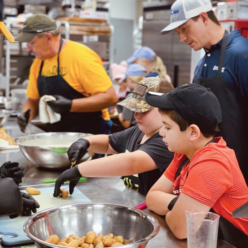 Josh Shea fosters fun and learning for kids ages eight to 16 during summer culinary camps at Joseph P. Riley Jr. Park.