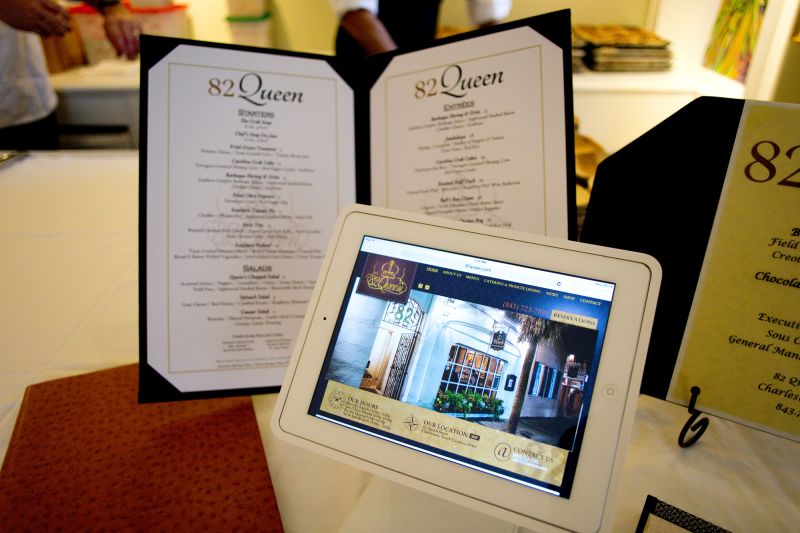 82 Queen set up an iPad at their station in the John C. Doyle Gallery so that guests could make future reservations at the restaurant.