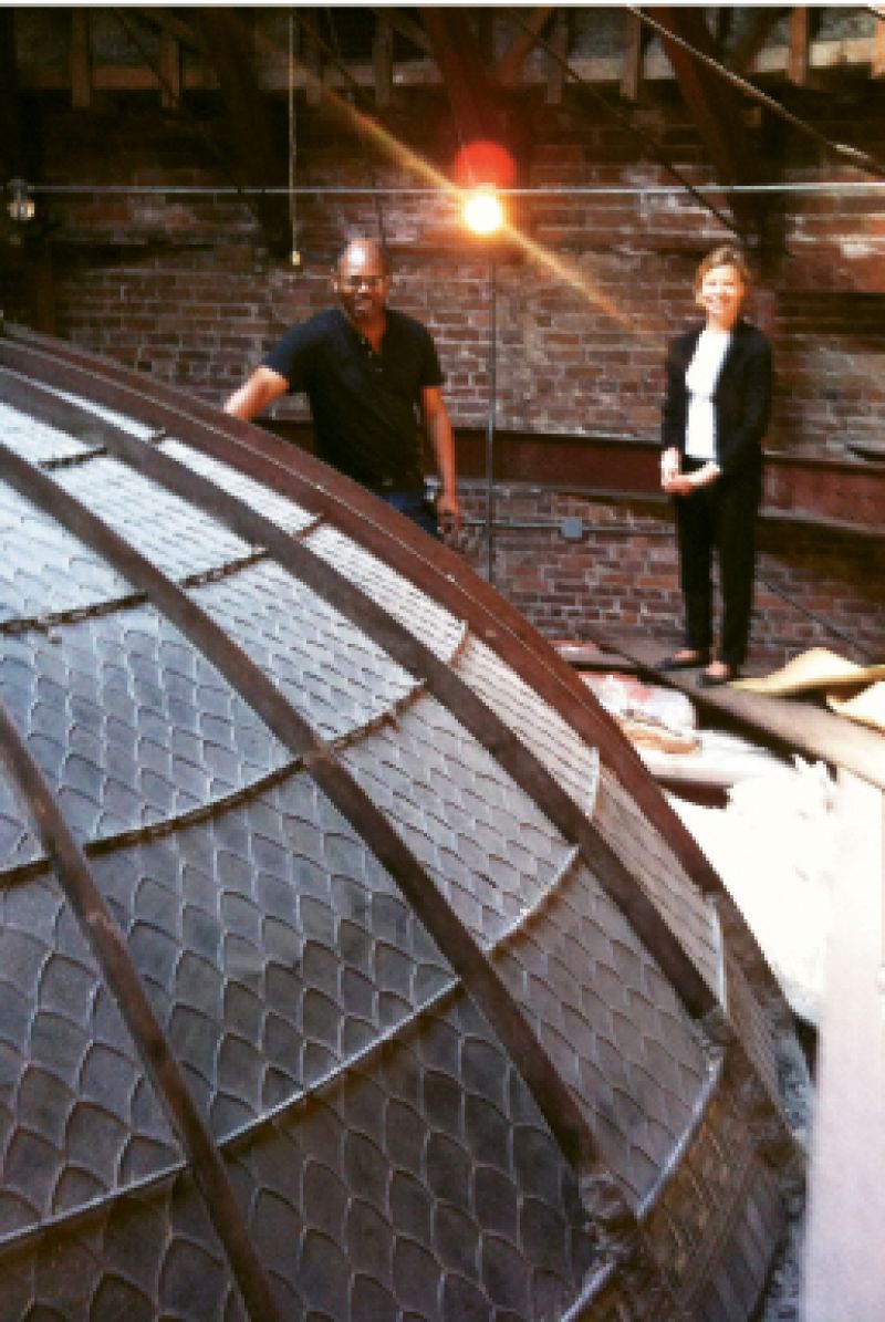 Gibbes operations manager Greg Jenkins and lighting consultant Anita Jorgensen examine the dome structure from above the Rotunda Gallery.