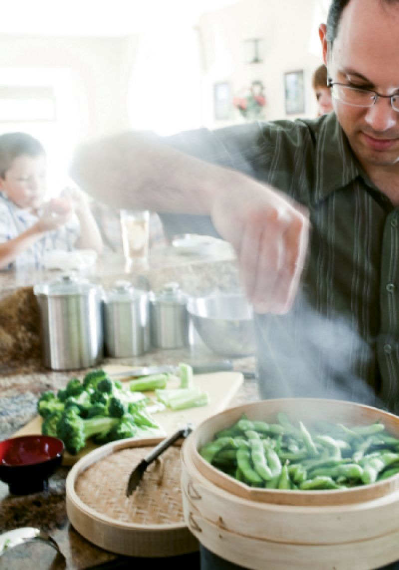 While the boys work, Marc steams some edamame for everyone to snack on as the main course cooks.
