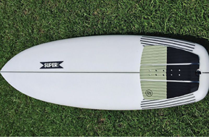 Surf’s Up: “I bought this board when I moved up here. I’d always surfed small, thin boards. I moved over to basically a dad-bod board. You can still rip it though—it’s actually faster.”