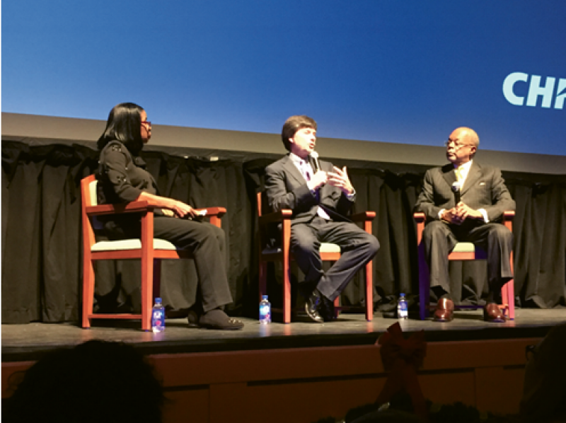 Ken Burns (center) and Henry Louis Gates Jr. at the Gaillard Center for “American Fault Line,” a conversation moderated by Carolina Youth Development director Barbara Kelly Duncan (left) Photograph by Stephanie Hunt