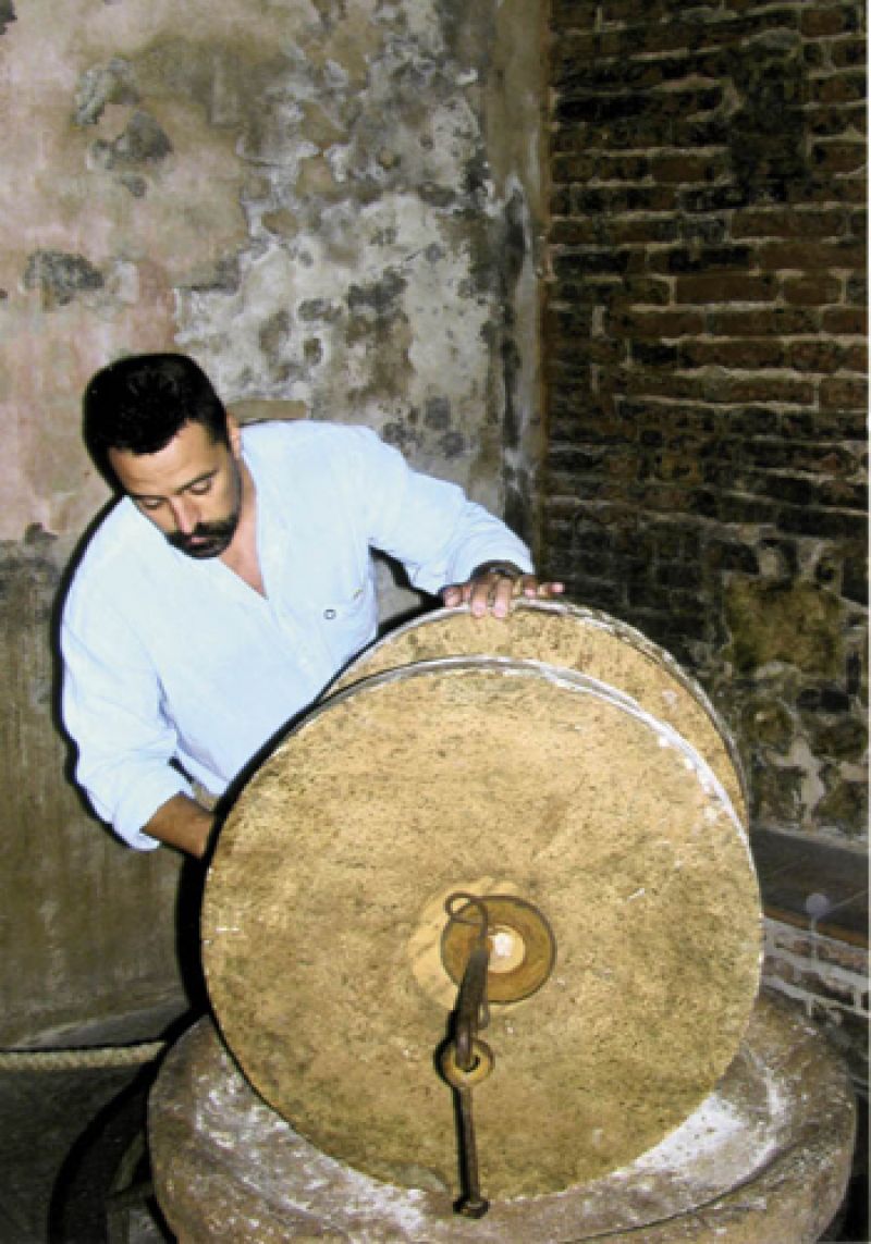 Massi leads his guests through cellars and shops of local food purveyors.