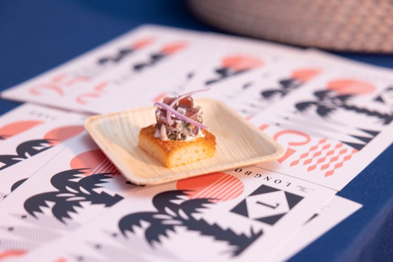 The Longboard’s chef Ryan Camp created bite-sized brioche toasts topped with cured tuna, citrus crème fraîche, and red onion.