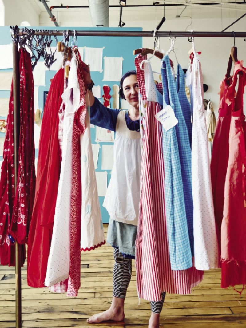 Some of the collection’s dresses are off-the-rack functional pieces in prints and solids (above), while others are more sculptural art creations: full-size frocks with rust or pencil-drawn markings over-dipped in starch to hold their form.