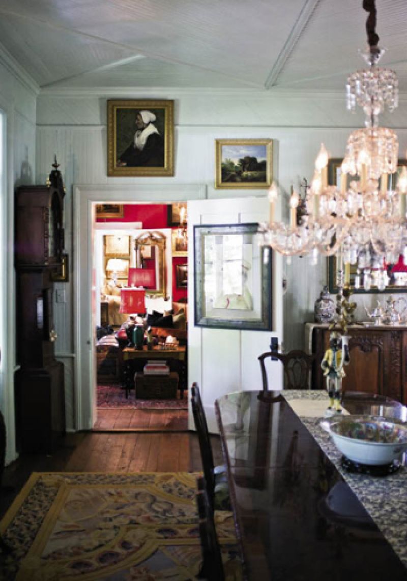 “Part of my love for cooking is a passion for dishes,” says Gerald, noting that the 18th-century wardrobe (left), where antique Imari is stored, hails from the Far East and was handcrafted with immaculate detail and shellacked in oxblood lacquer.