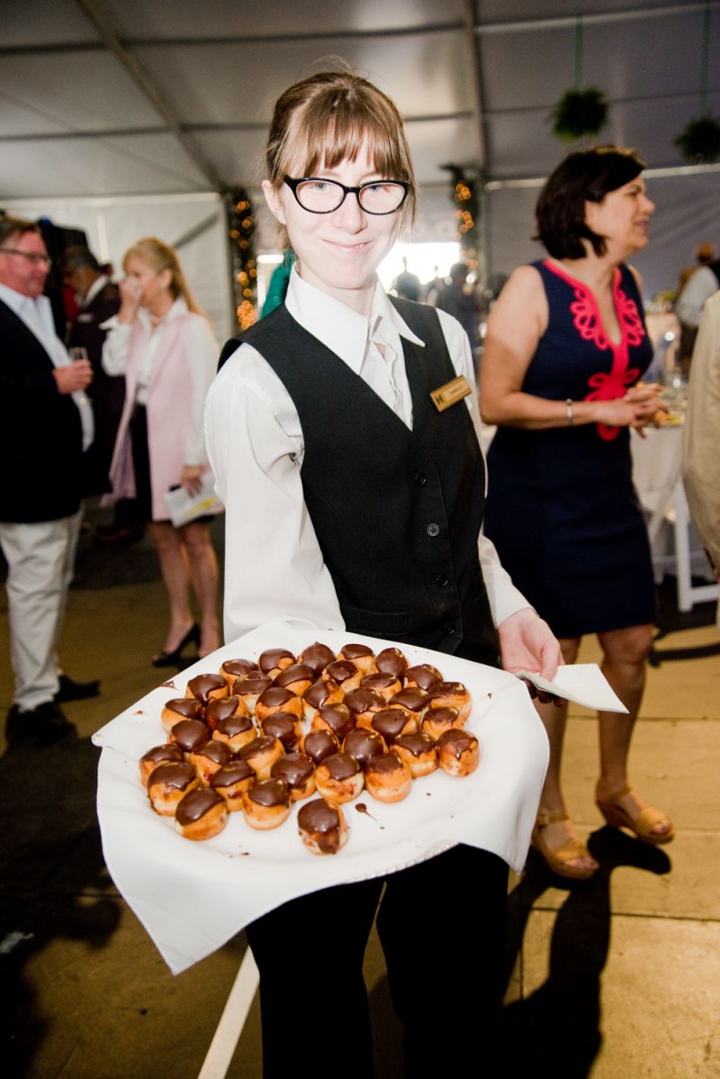 Waiters offered Dunkin&#039; Donuts and Irish coffees to arriving guests.