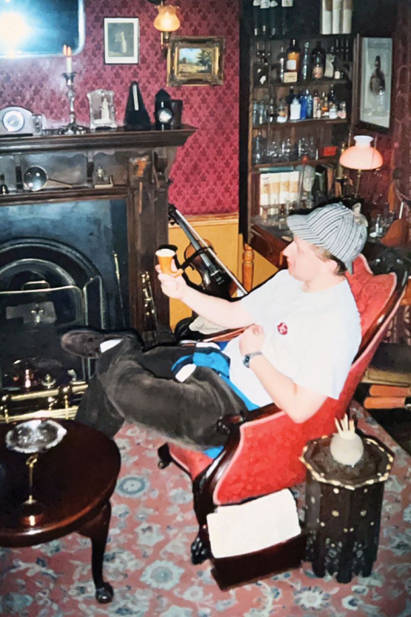 Yuriy in 2000 at London’s Sherlock Holmes museum, wearing Holmes’s hat and holding his pipe; “I love that his violin is in the background,” he says.
