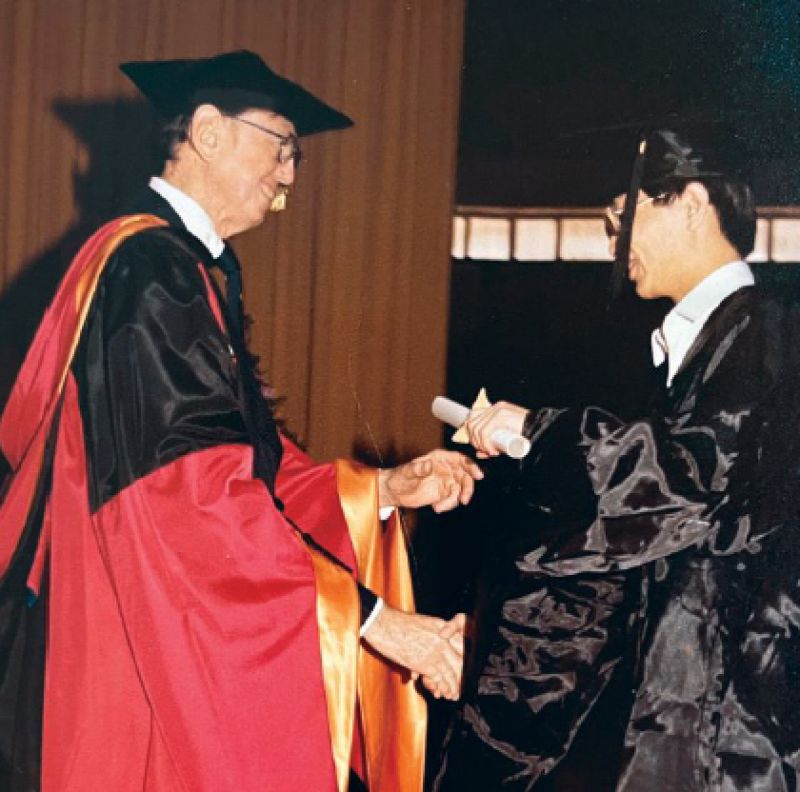 Hsu, receiving his doctoral degree