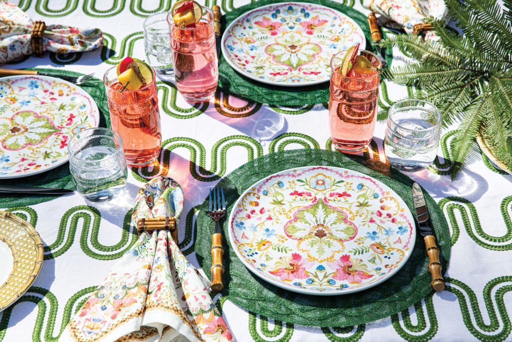 <i>A garden party tabletop of Juliska products, including the “Sofia” napkins and melamine plates.</i>