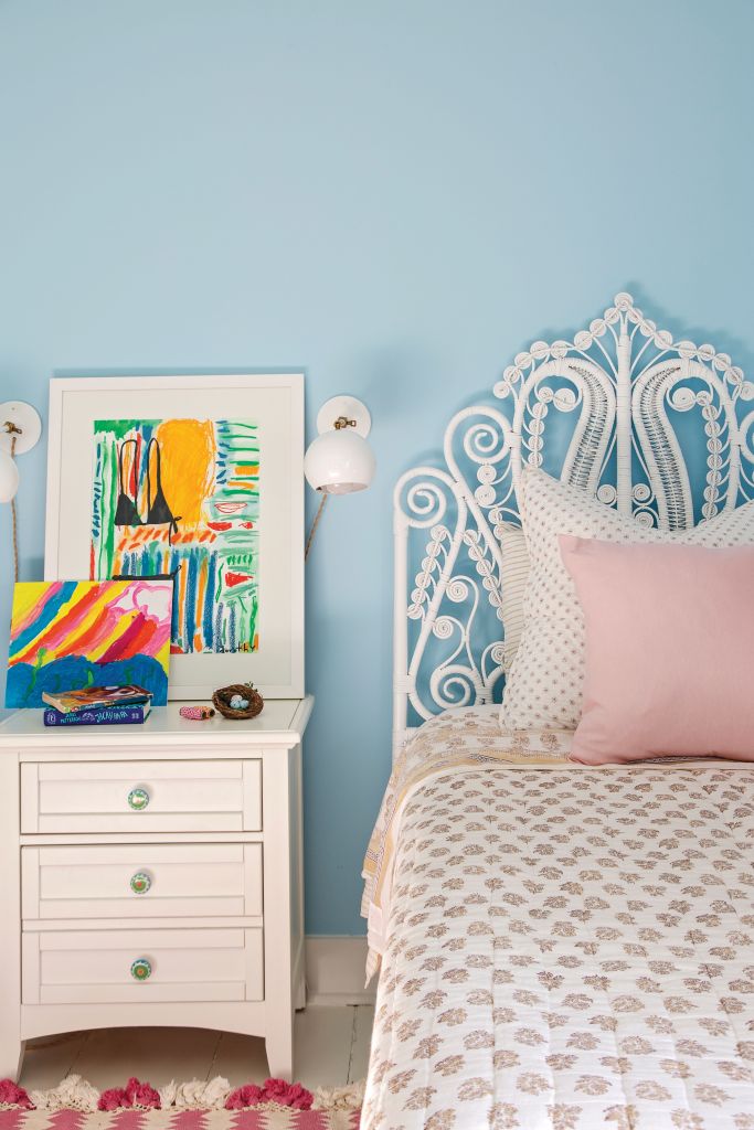 <strong>Retro Vibes</strong> - A rattan, vintage-style headboard from Serena &amp; Lily lends a touch of girlish charm to this beachside bedroom. <strong>Location:</strong> Sullivan’s Island <strong>Issue:</strong> August 2019, “Beachy Keen” <strong>Photographer:</strong> Julia Lynn  <a href="https://charlestonmag.com/features/beachy_keen_0"><strong>&gt;&gt;CLICK HERE TO READ THE ARTICLE</strong></a>