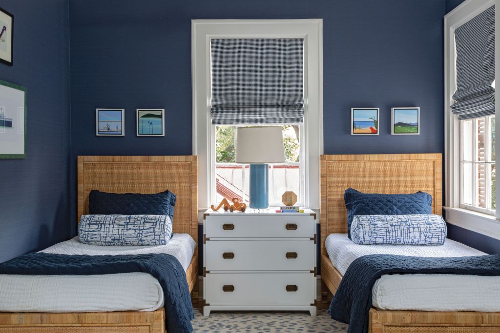 <strong>In the Navy</strong> - Designer Stephanie Molster outfitted this snappy room for two young boys. The Phillip Jeffries wallpaper sets the tone. Added bonus: it’s vinyl and a cinch to wipe clean. <strong>Location:</strong> Downtown, South of Broad <strong>Issue: </strong>April 2020, “Just Right” <strong>Photographer:</strong> Julia Lynn<strong> <a href="https://charlestonmag.com/features/bright_airy_south_of_broad">&gt;&gt;CLICK HERE TO READ THE ARTICLE</a></strong>