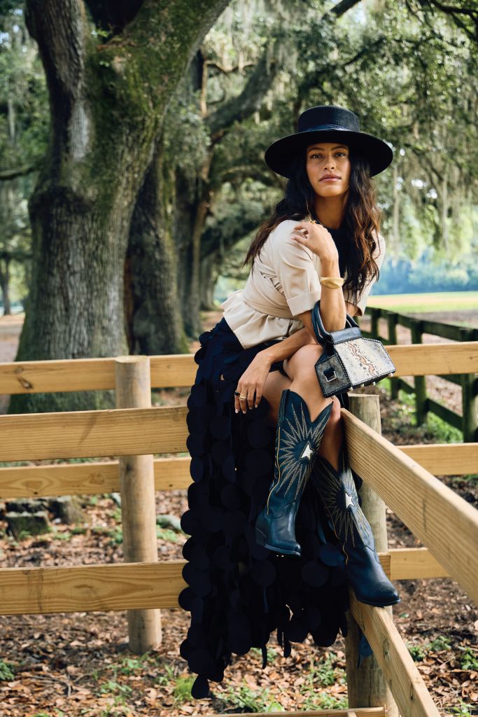 <b>Sitting Pretty:</b> Just Be Queen “Naia” top, $395 at Beckett Boutique; AWAKE MODE multilayered, circle maxi skirt, $1,120 at Showroom Kiawah; Legend of Geraldine, “Darcy” bolero-style hat in hare felt, $650 at legendofgeraldine.com; Golden Goose “Wish Star” leather boots, $960 at Golden Goose; Peserico leather necklace with diamond-cut chain, $240 at Peserico; Boysterous doctor’s bag in stingray leather, $2,000 at Boysterous; Dean Davidson “Lagos” cuff, $395, “Plaza” tigereye ring, $345, “Petit Pavé” stacking rings, $160-$275 each, and “Mini Plaza”onyx ring, $250, all at Well Furnished.