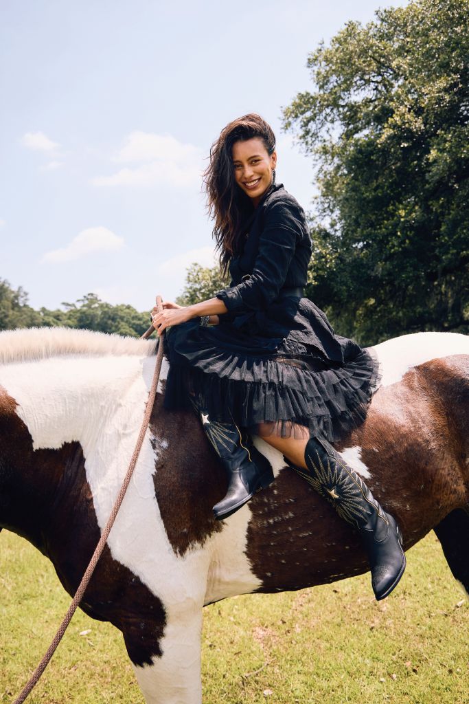 <b>Riding High:</b> Forme d’Expression linen jacket, $1,248 at Havens; Ruby &amp; Pearl tulle dress, $300 at The Showroom Charleston; Johnny Farah “Single Roll” buckle belt, $288 at Havens; Jean-Francois Mimilla earrings, $249, and bracelet, $595, both at Worthwhile; Rosa Maria “Flavie Smokey” diamond and quartz ring, $2,908 at Havens; Golden Goose “Wish Star” leather boots, $960 at Golden Goose.