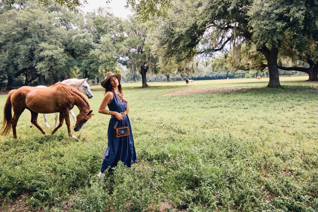 Model Kayla Thomas with horses, Krinkle and Rhodium, at Middleton Place Equestrian Center.