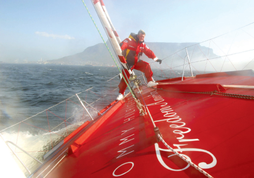 Brad sails off the coast of South Africa just beyond Cape Town’s prominent Table Mountain. Photographs by Billy Black.