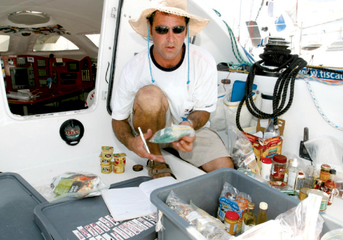 Kurt Oberle of High &amp; Dry Boat Works organizes provisions. Photographs by Billy Black.